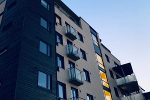 newer apartment building with balconies.