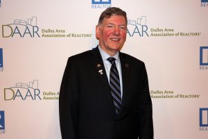 Allan Marteney poses for a photo after being installed as 2023 DAAR President